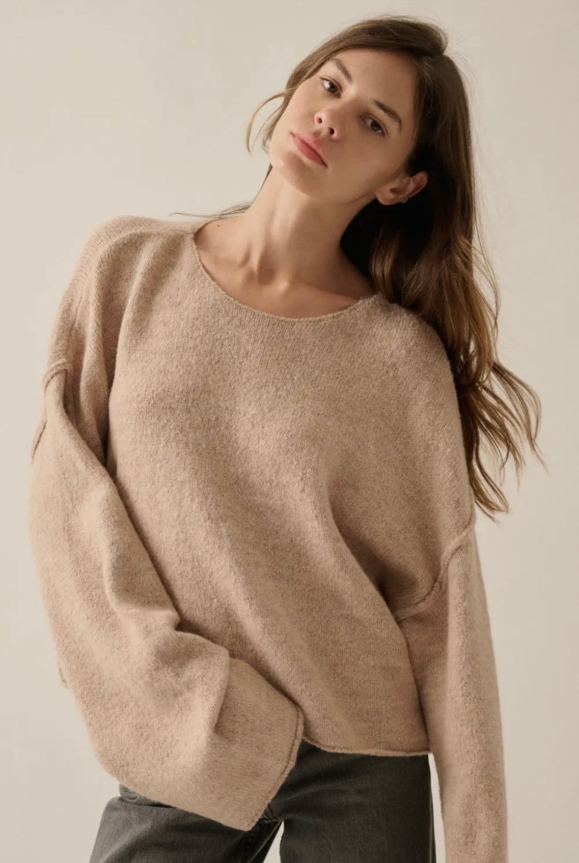 Solid textured knit exposed seamless loose-fit sweater